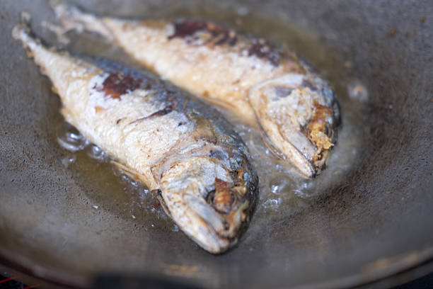 istock Mackerel frying, Fried mackerel on pan 2241360702
