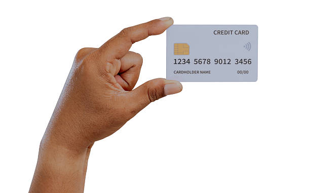 istock Hand holding a credit card. 2241361035