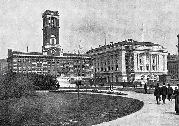 istock Providence, Rhode Island, Providence, Rhode Island, Central Fire Station with its hose-drying tower whose great bell once thundered above the city, louder than any church, and the new Post Office on the right 2241361623