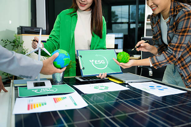 istock Discussion among businesspeople on the latest developments in solar cell panel technology and Solar Energy Environment city Concept. 2241371609
