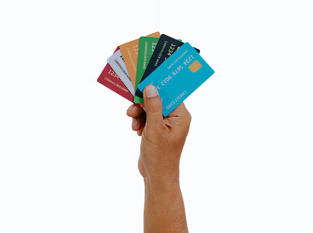 istock Hand holding a credit card. 2241375279