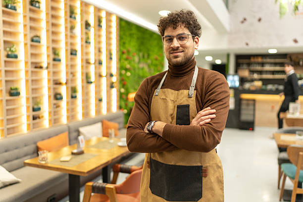istock Small business owner chef smiling in modern restaurant 2241378457