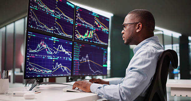 istock African American Man Working As Stock Broker 2241387664