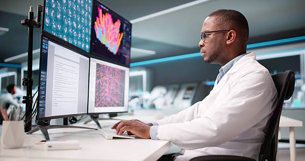 istock African American Scientist In Lab Writing Research Paper 2241387677