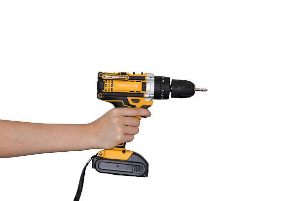 istock Hand holding pressing the drill isolated on white background. 2241388294