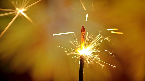 istock Bengal fire against the backdrop of festive fireworks with bokeh effect 2241391585