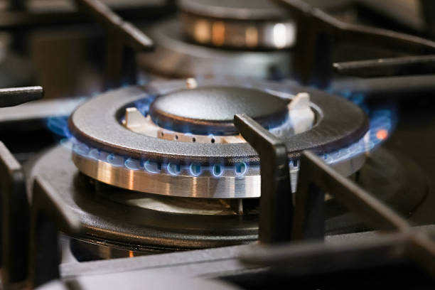 istock Blue flame burning on modern gas stove burner 2241402073