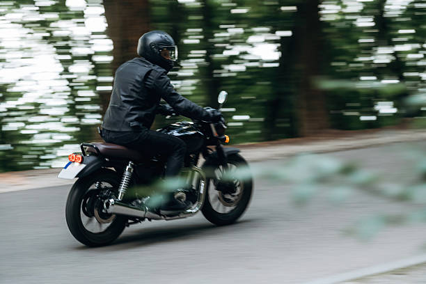 istock Speed conception, driving. Man in leather clothes on motorcycle is on the road 2241405880