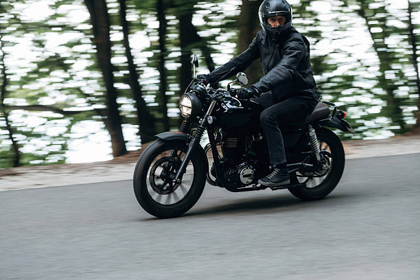 istock Speed conception, driving. Man in leather clothes on motorcycle is on the road 2241405890