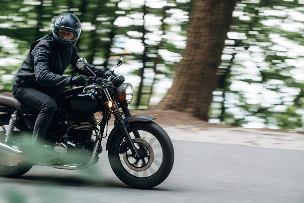 istock Speed conception, driving. Man in leather clothes on motorcycle is on the road 2241405900