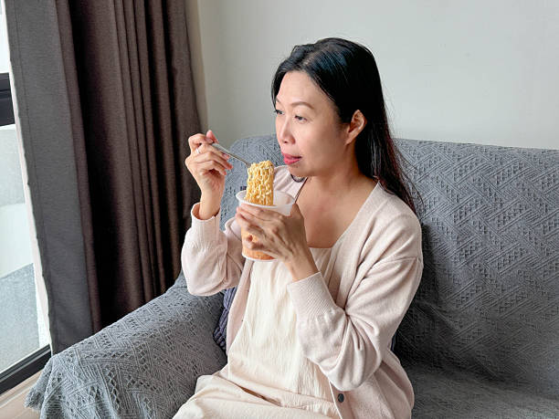 istock Taste of Simplicity: Savoring Instant Noodles at the Table 2241407777