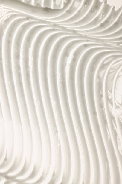 istock white cream smear, cosmetics textures on the white background 2241408900