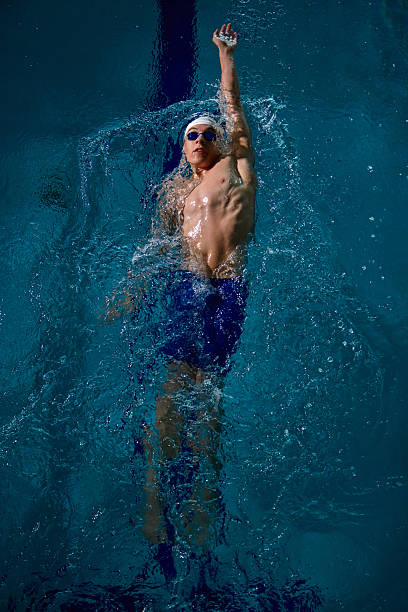 istock Male swimmer backstroke technique underwater with focus and control 2241412966