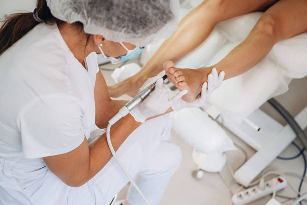 istock Detailed close up view. Podiatrist with client in clinic 2241413450