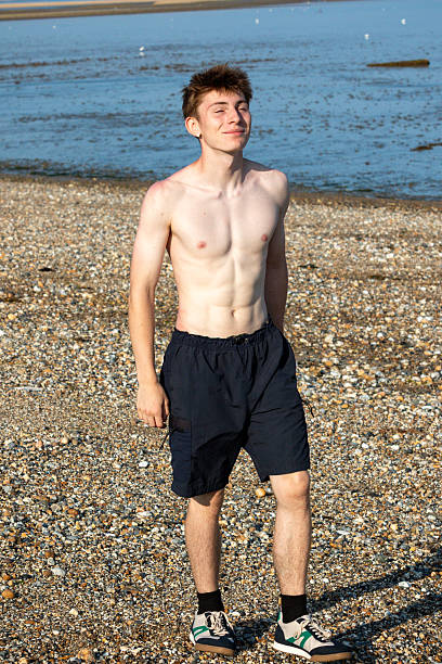istock Teenage Boy Walking towards The Camera 2241416913