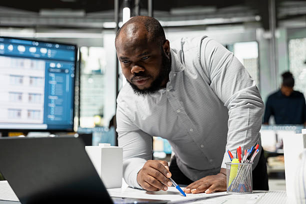 istock African american developer focuses on land acquisition and construction planning 2241423122