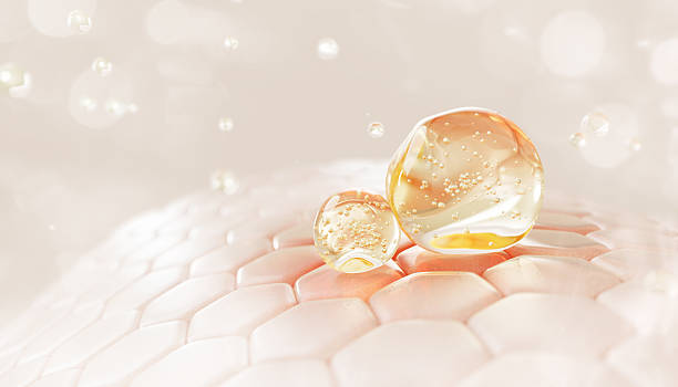 istock Skin cells with red patch and argan oil drops texture. Epidermis layer with gold liquid serum droplets, collagen gel with bubbles, yellow honey face mask. Cosmetic skincare background 2241427686