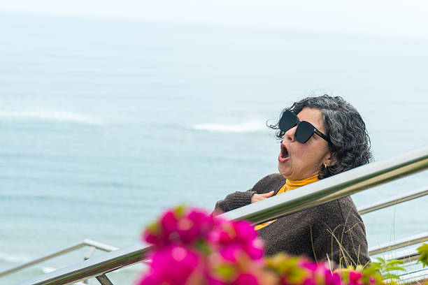 istock A woman wearing sunglasses 2241428806