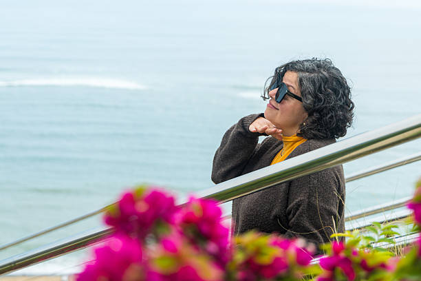 istock A woman wearing sunglasses 2241428808