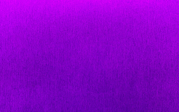istock Vibrant, neon purple fabric with a subtle vertical weave texture. This high-quality, seamless textile background is perfect for creative projects, upholstery. 2241434888