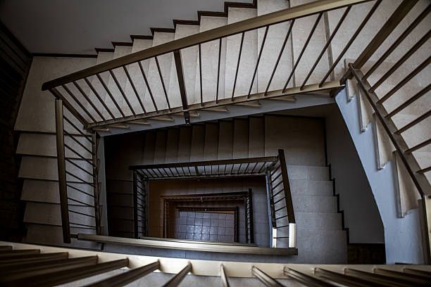Closeup modern spiral staircase, abstract background with copy space, full frame horizontal composition