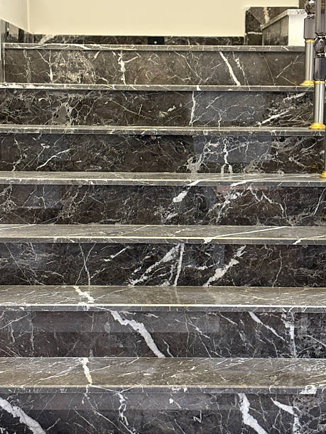 istock Home interior granite stone stairs. Modern gray marble stairs 2241439824