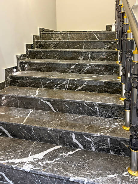 istock Home interior granite stone stairs. Modern gray marble stairs 2241439879