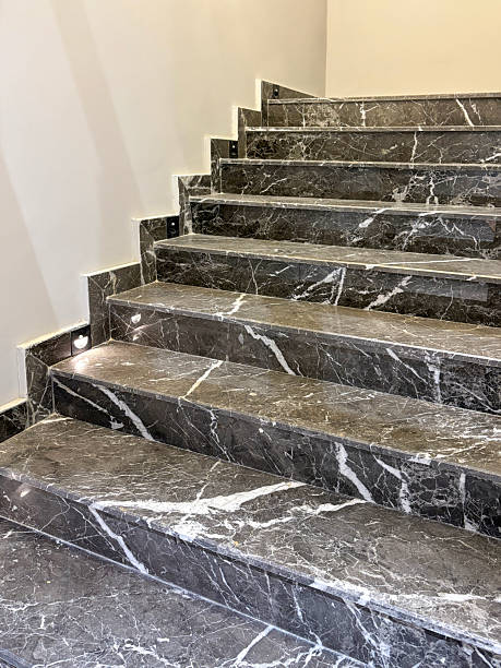 istock Home interior granite stone stairs. Modern gray marble stairs 2241440054