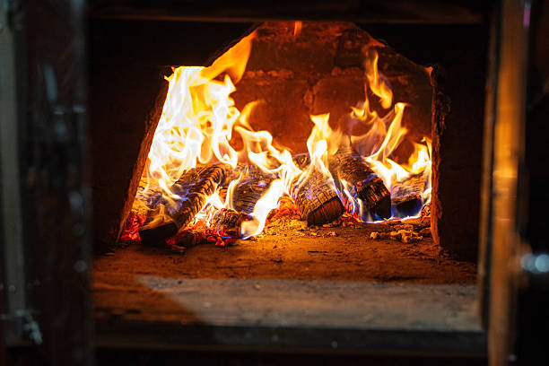 istock Burning firewood in a traditional oven for baking 2241442284