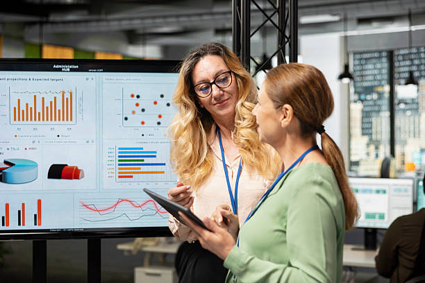 istock Female business team in a briefing session symbolizes efficiency 2241446071
