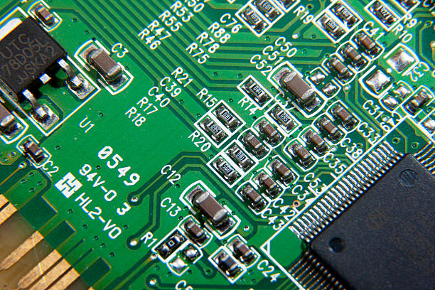 istock green electronic printed circuit board with assembled radio components 2241449968