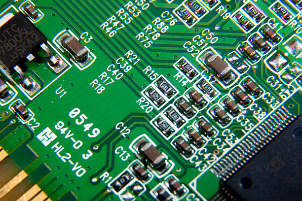 istock green electronic printed circuit board with assembled radio components 2241449969