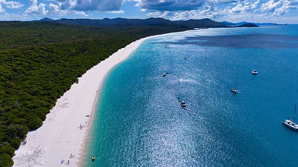 istock Tropical beach aerial view with turquoise waters 2241451439