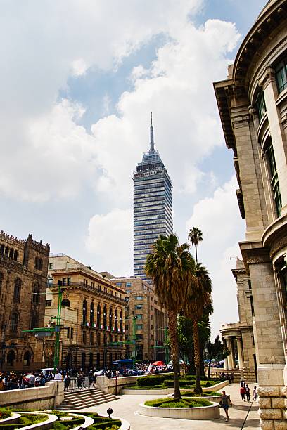 istock Skyscraper towers over historic Mexican city skyline. 2241451633