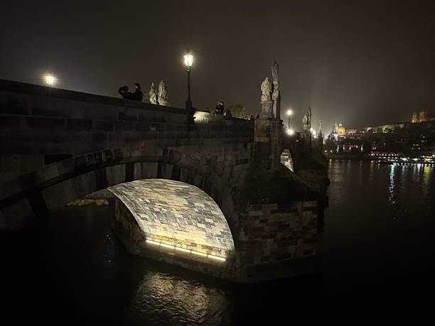 istock Charles bridge in dark night lit up in Prague Czech Republic 2241453985