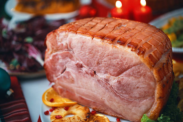 Christmas Dinner with Baked Glazed Ham and Various Vegetables
