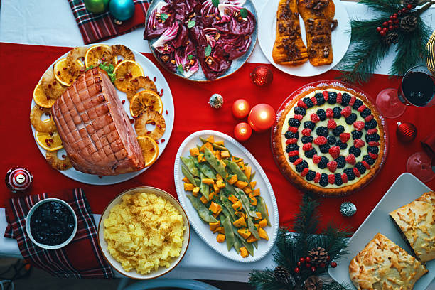 Overhead shot of place setting and Christmas Wreath, isolated on white background with clipping path.