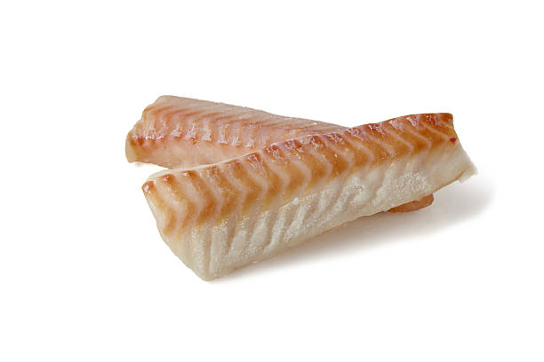istock Two pieces of fresh frozen cod fish fillet isolated on white background front view 2241455970