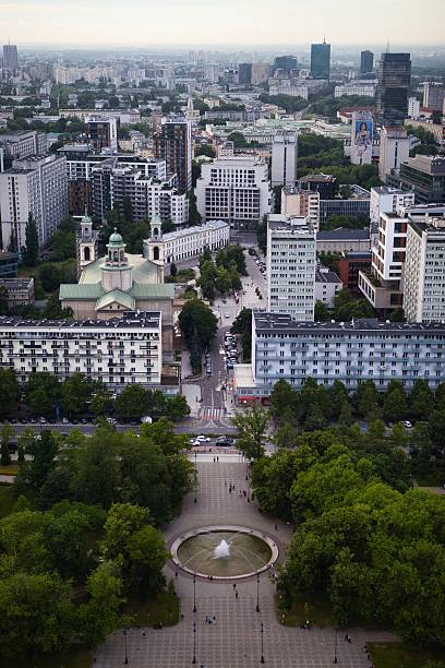 istock Cityscape: Cathedral and Fountain Amidst Modern Architecture 2241457053