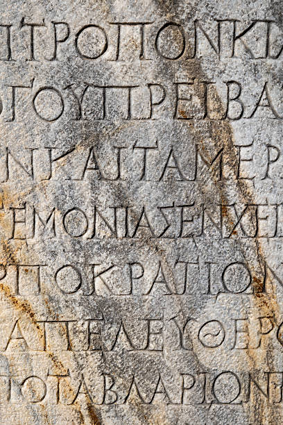 istock Ancient inscriptions on stone in archeological ruin in Ephesus, Turkey 2241457713