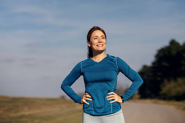 Woman feeling refreshed after outdoor workout session