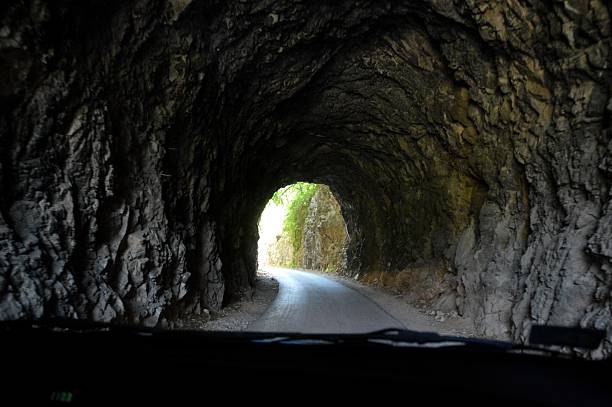 istock old large tunnel in the rock 2241459912