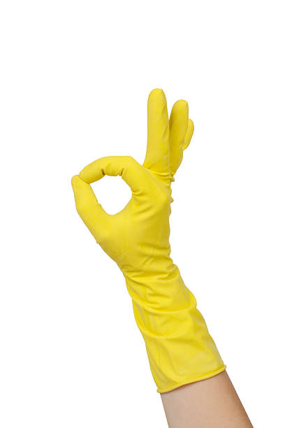 istock Hand Wearing Glove Shows OK Sign Isolated 2241461037