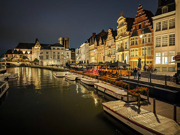 Ghent, Belgium. 12 October 2025. Graslei district restaurants line the waterfront in Ghent