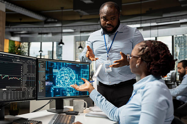 istock Manager supervises work of financial expert in office using large language model 2241466377
