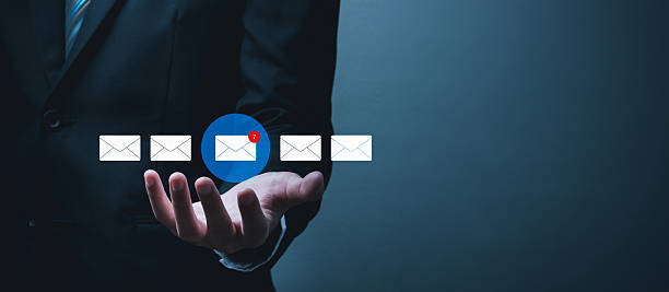 istock business man in suit with digital graphic mail message on hand, new chat message, new email notification, cyber security, digital marketing, business finance, internet network technology concept 2241466586