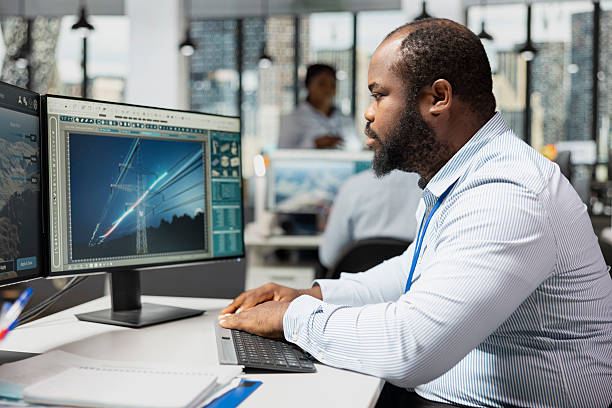 istock Engineer working for green tech company designs eco power line towers 2241467949