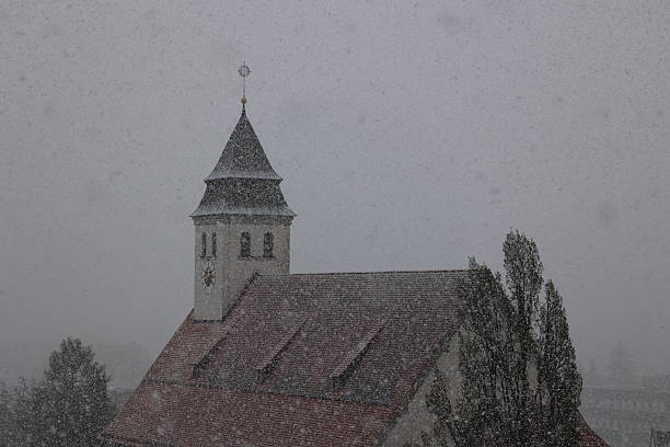 istock A church steeple covered in snow 2241469370