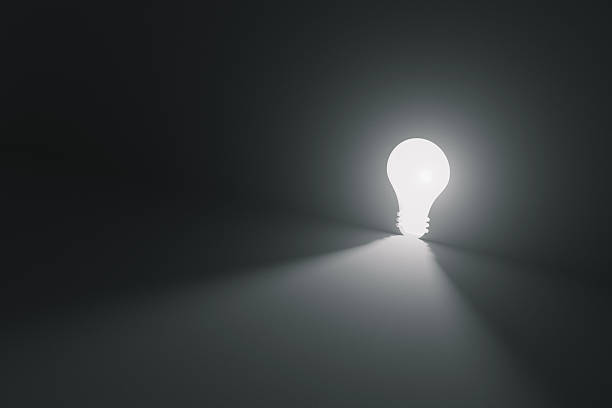 istock Glowing light bulb door in a dark minimalist space symbolizing creativity, innovation, and bright ideas. Concept of inspiration, technology, and new thinking in a modern setting. 2241469951
