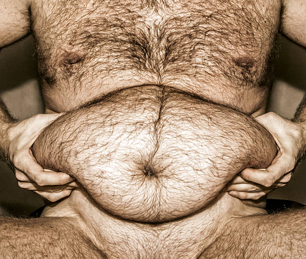 Side profile of obese man showing large belly and body fat on white background, concept of obesity awareness and health risk